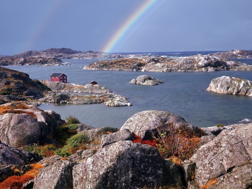 rainbow over tjorn island sweden wallpaper