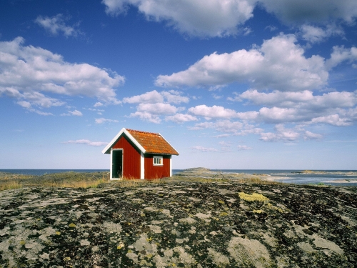 small hut at the coastline of the baltic sea tjust archipelago sweden wallpaper